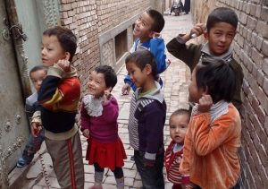 Children are marked with indelible ink behind their ears as a way of tracking whether they have been vaccinated Yvan Hutin