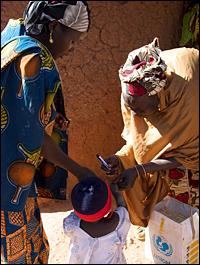 A child’s finger is marked after being vaccinated. Bodinga, Nigeria photo:Christine McNab