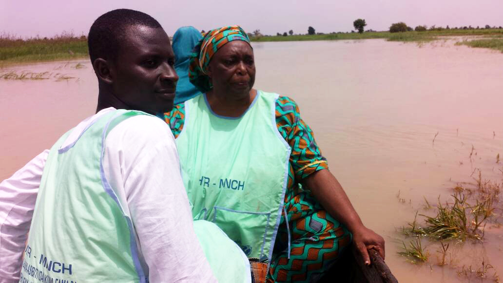 Salamatu Kabir (right), a HTR team lead, travels with other health workers to vaccinate children across two local government districts. © UNICEF Nigeria